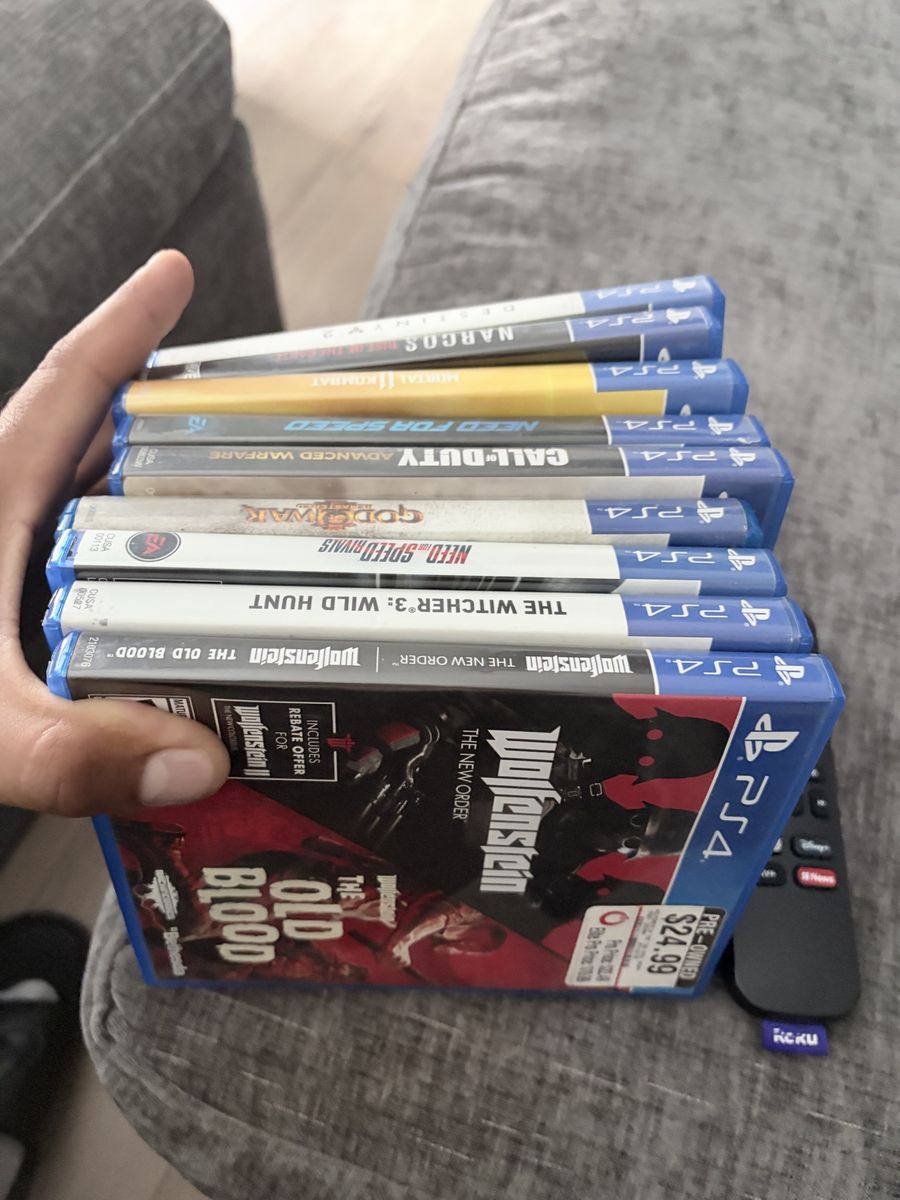 Sony PlayStation 4 Console Bundle with 2 Controllers and 9 Games
