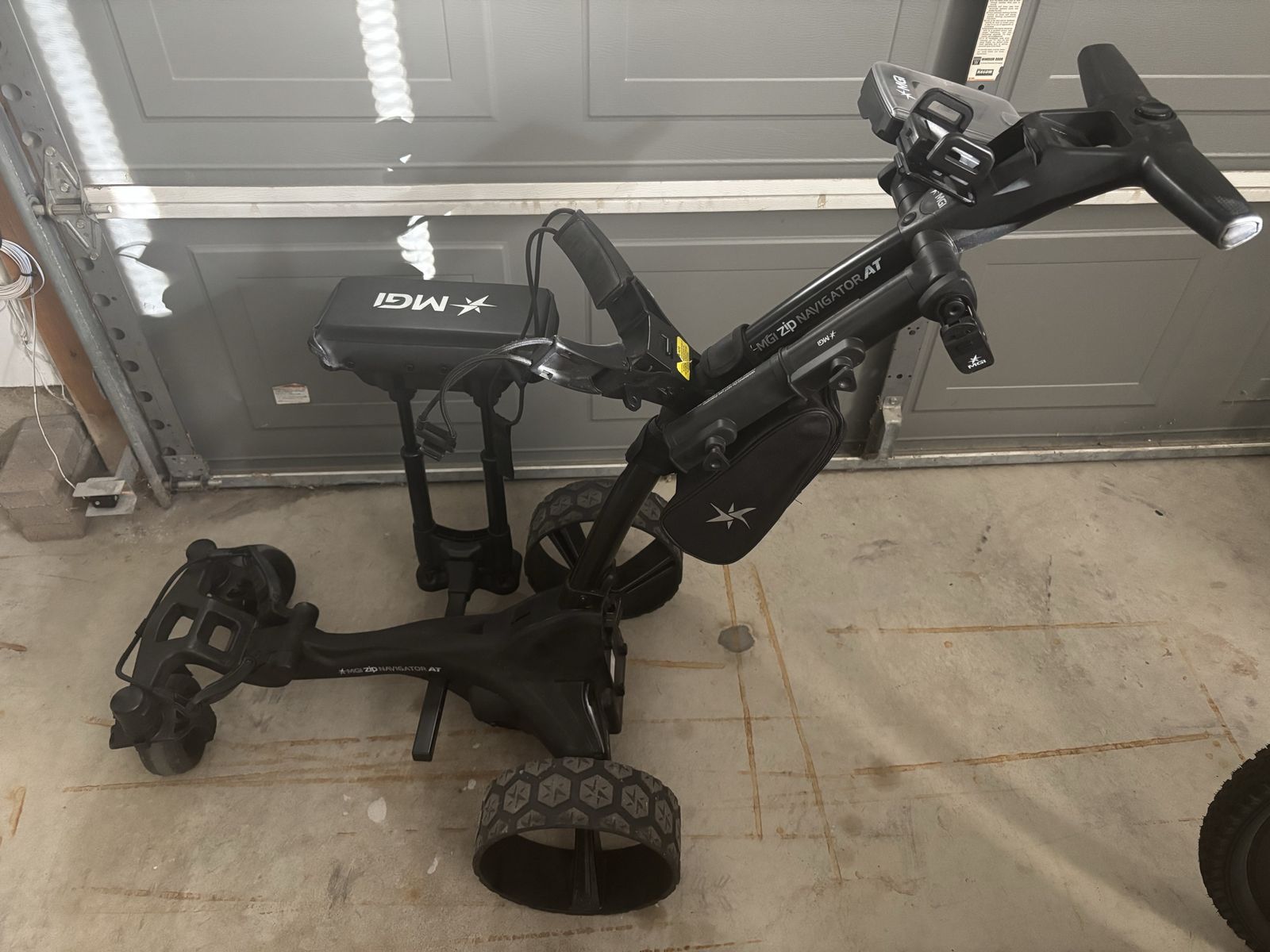 MGI Zip Navigator AT Electric Golf Caddy Trolley with Remote