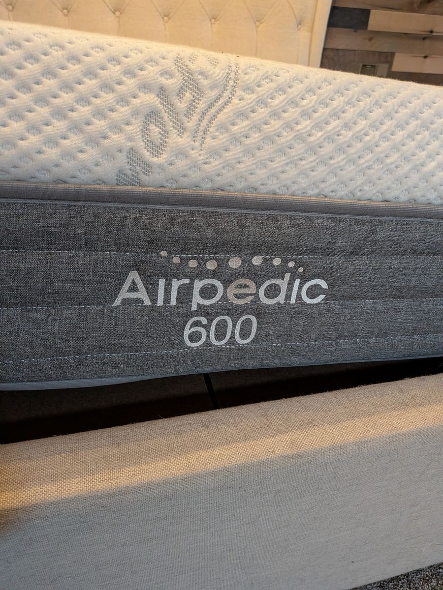King - Airpedic adjustable firmness mattress.