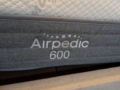 King - Airpedic adjustable firmness mattress.