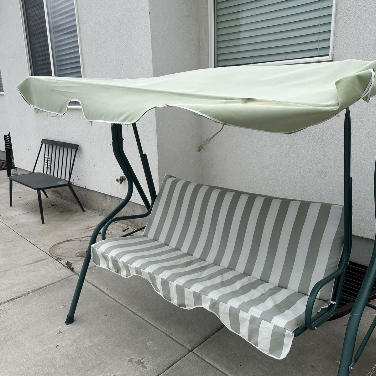 Green Striped Swinging Bench