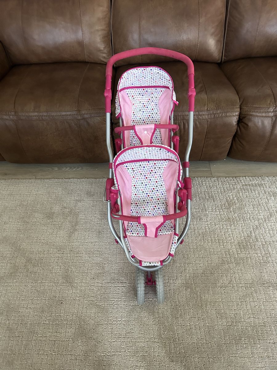 Child’s toy double stroller