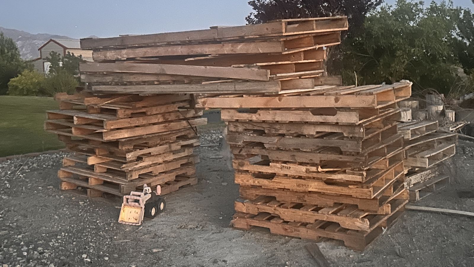 Used Wooden Pallets - Mixed Sizes, Stackable for Various Projects
