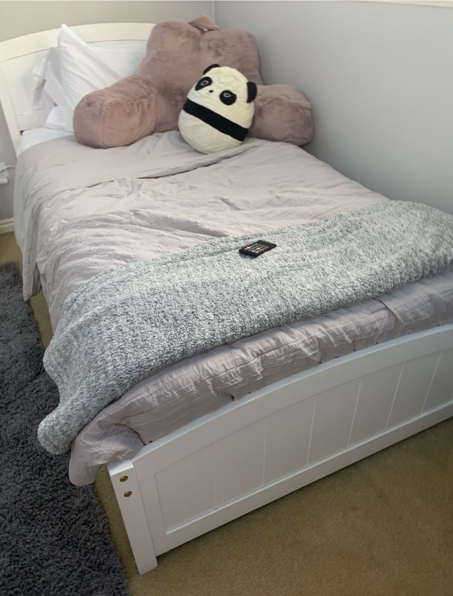 Clean and cute double bed frame with white sled headboard and footboard