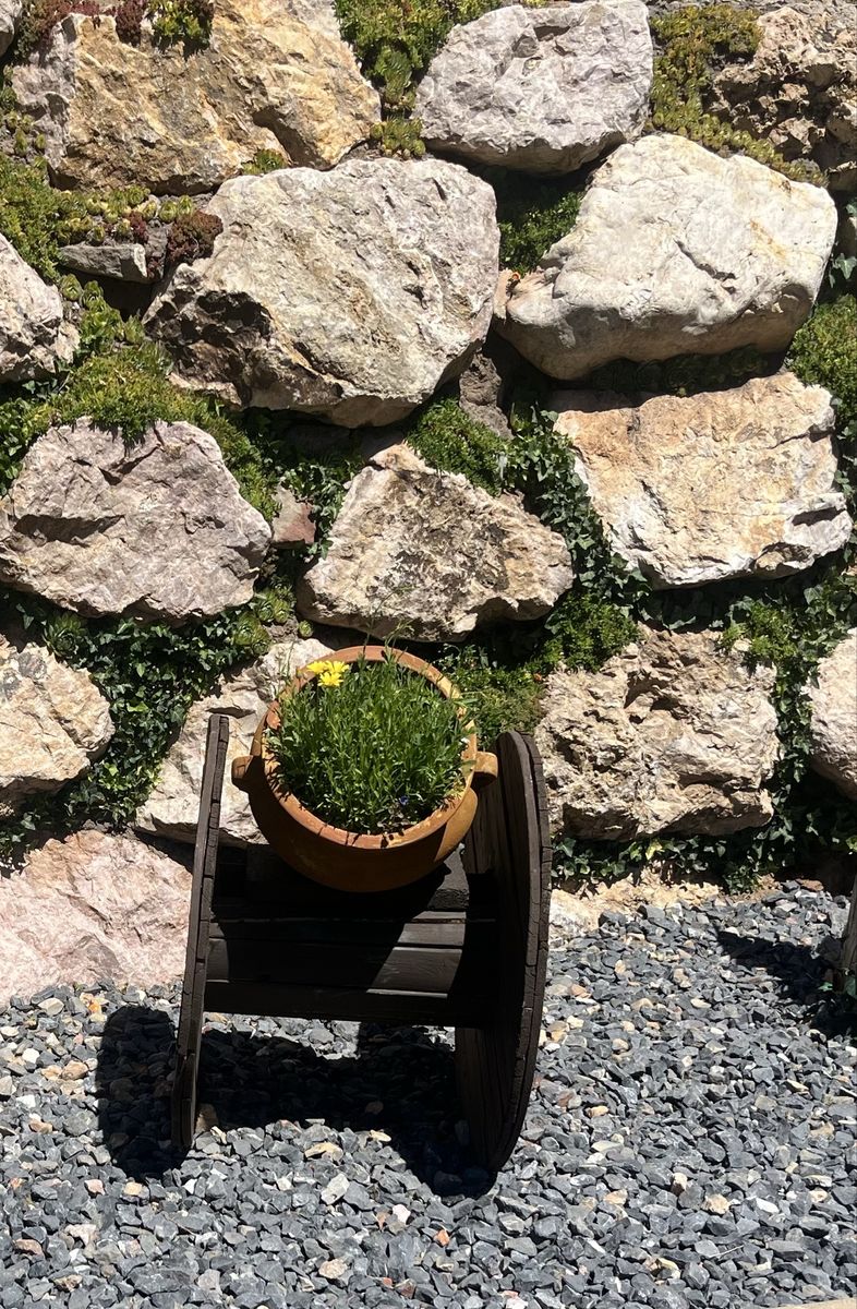 Two wooden spool flower pot stands