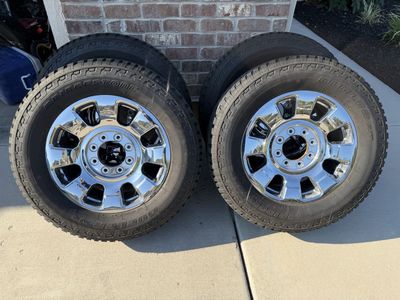 2026 Ford F350 chrome wheels and tires.