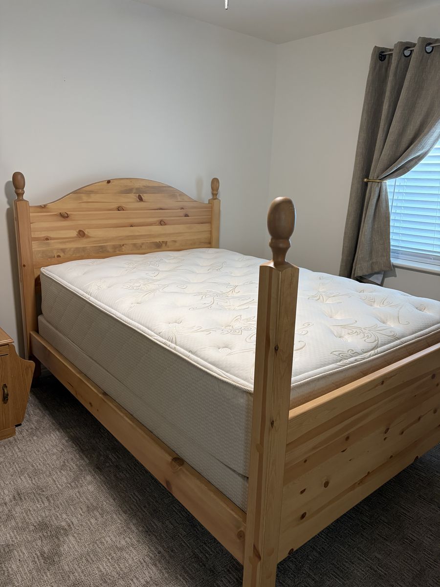 Full size bed, mattress and box springs.