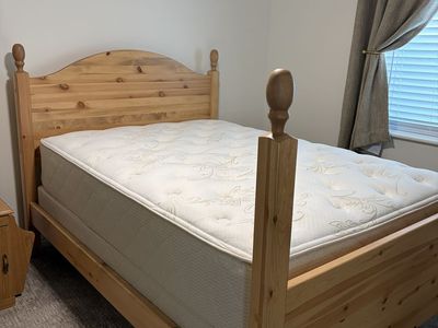 Full size bed, mattress and box springs.