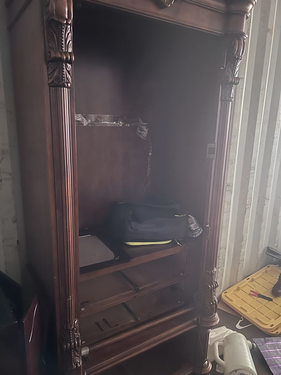 Armoire closet with glass mirror door