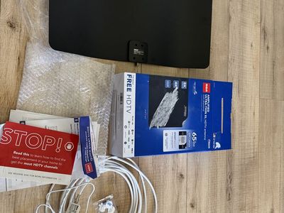 RCA Indoor TV Antenna with Amplifier for Smart TVs, 65 Mile Range, XL Ultra-Thin, White