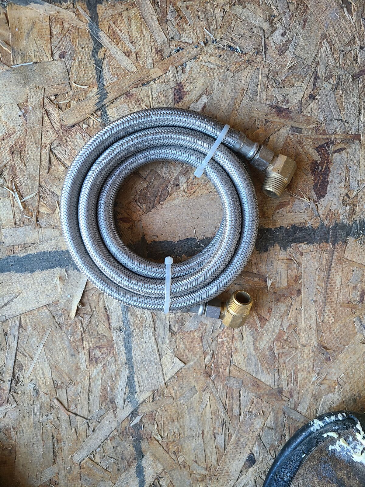 Dishwasher water supply lines.