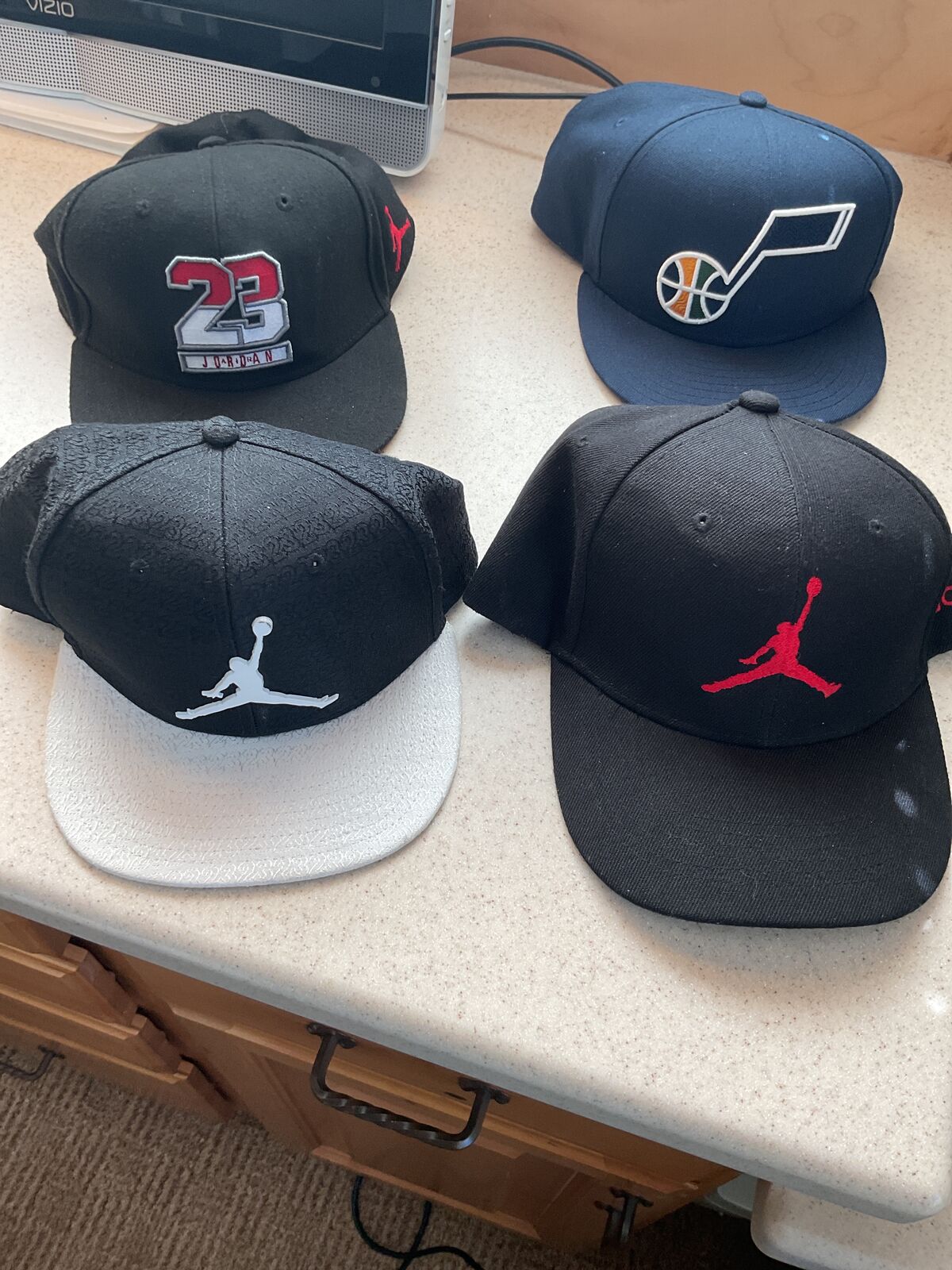 4 Youth Baseball Caps - ( 3) Jordan  (1) Jazz