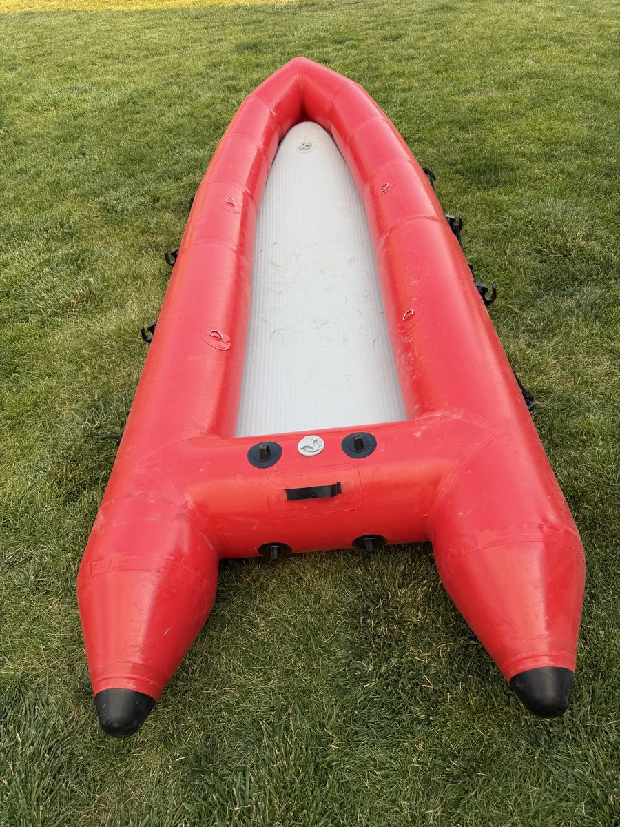 Red Inflatable pack Raft - Durable & Portable Watercraft