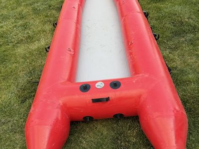 Red Inflatable pack Raft - Durable & Portable Watercraft