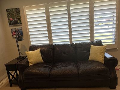Leather couch, chair, foot stool