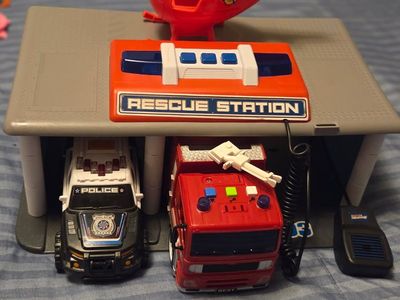 Rescue Station Playset with Police Car, Fire Truck, Helicopter, and Microphone