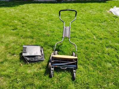 Fiskars manual reel mower with basket