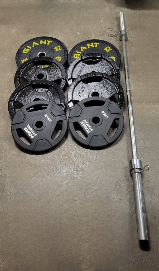 300 pounds of weights and barbell