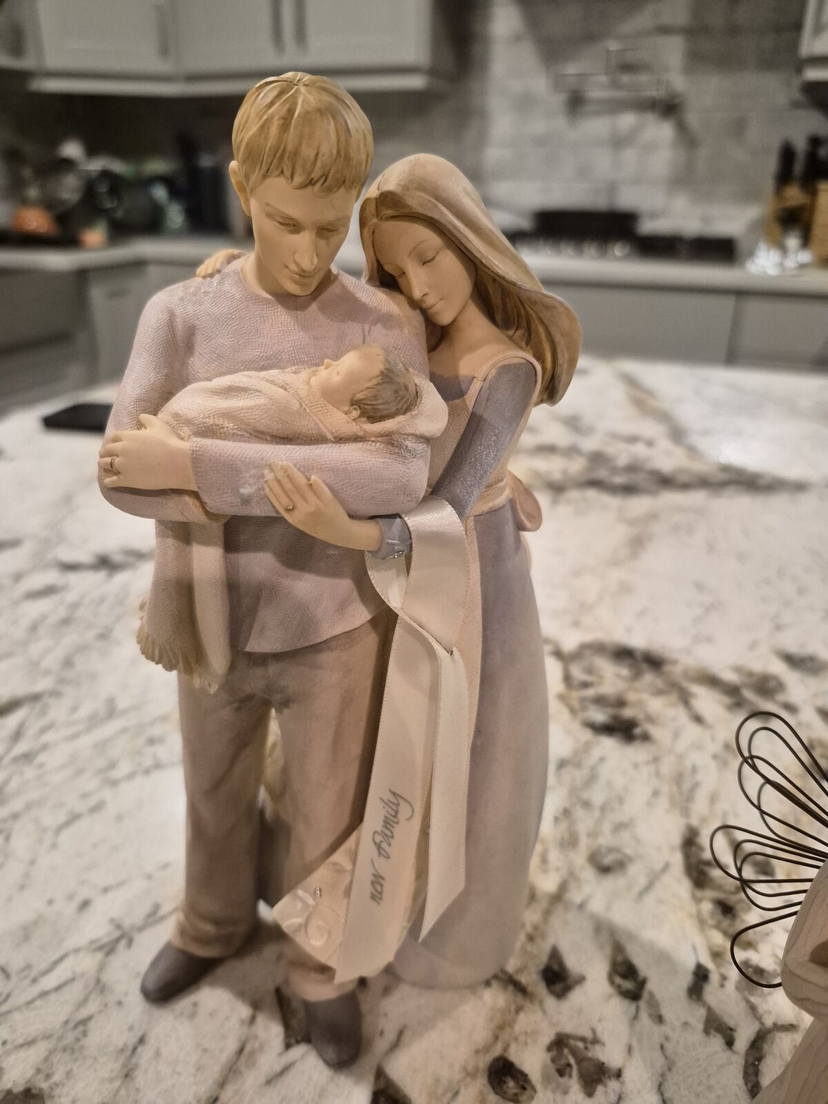 Foundations "New Family" Figurine & Willow Tree "Loving Angel" figurine.