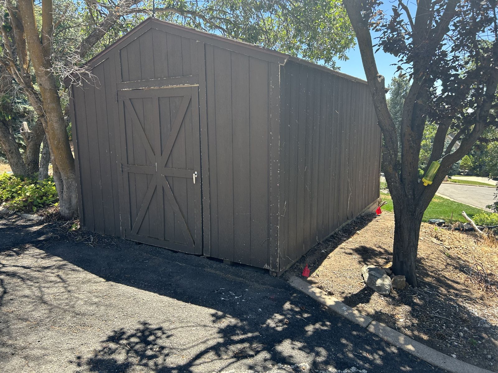 10’ x 14’ (122” x 170”) shed. Relandscaping. Must go.
