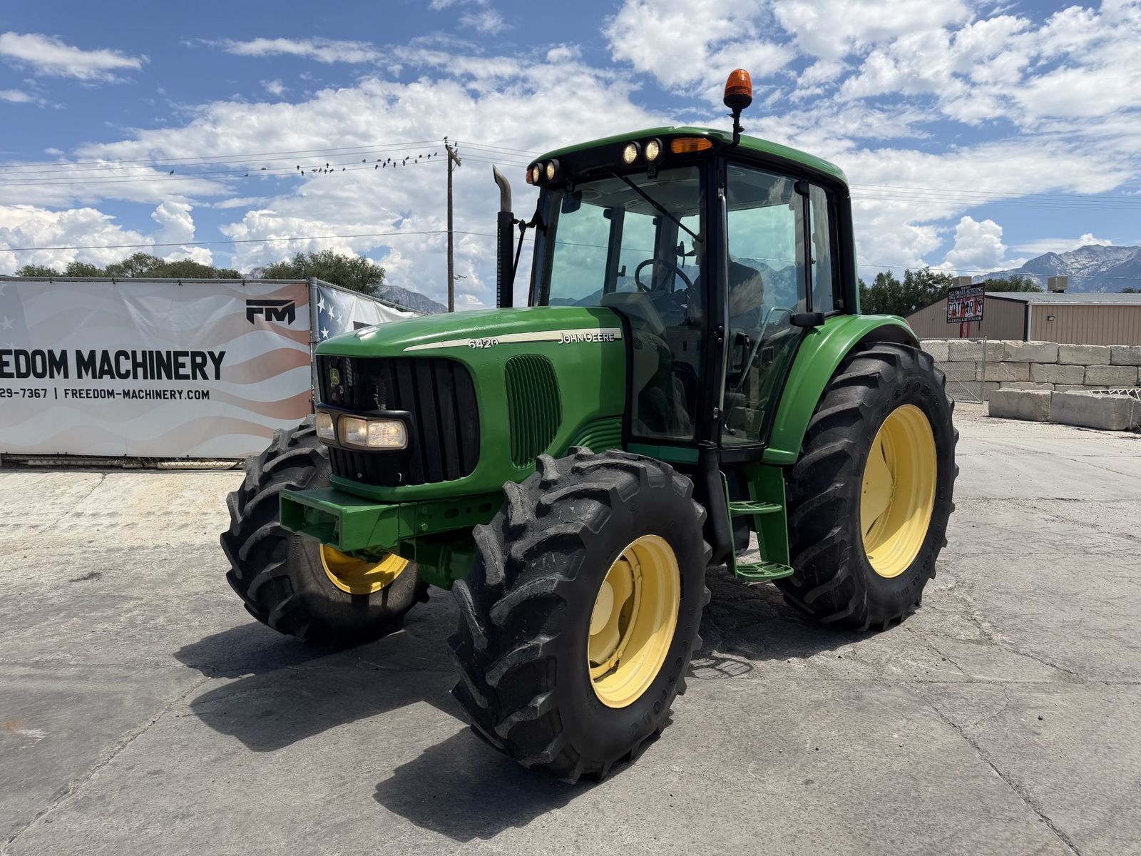 2006 John Deere 6420 MFWD Tractor – PowrQuad • Cab • Heat & A/C • $41,900