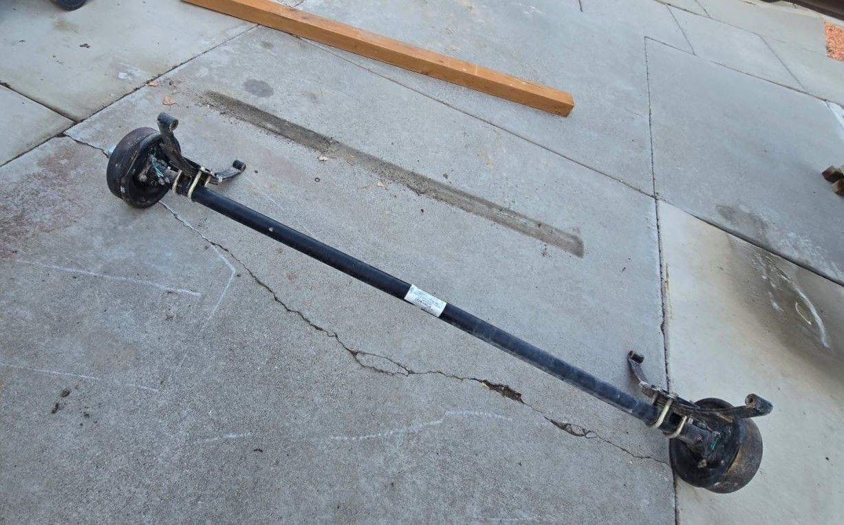 Trailer AXLES  like NEW COMPLETE WITH SPRING, HUB, ELECTRIC BRAKES