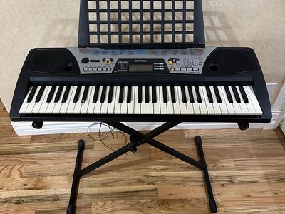 Yamaha Piano Keyboard and Stand