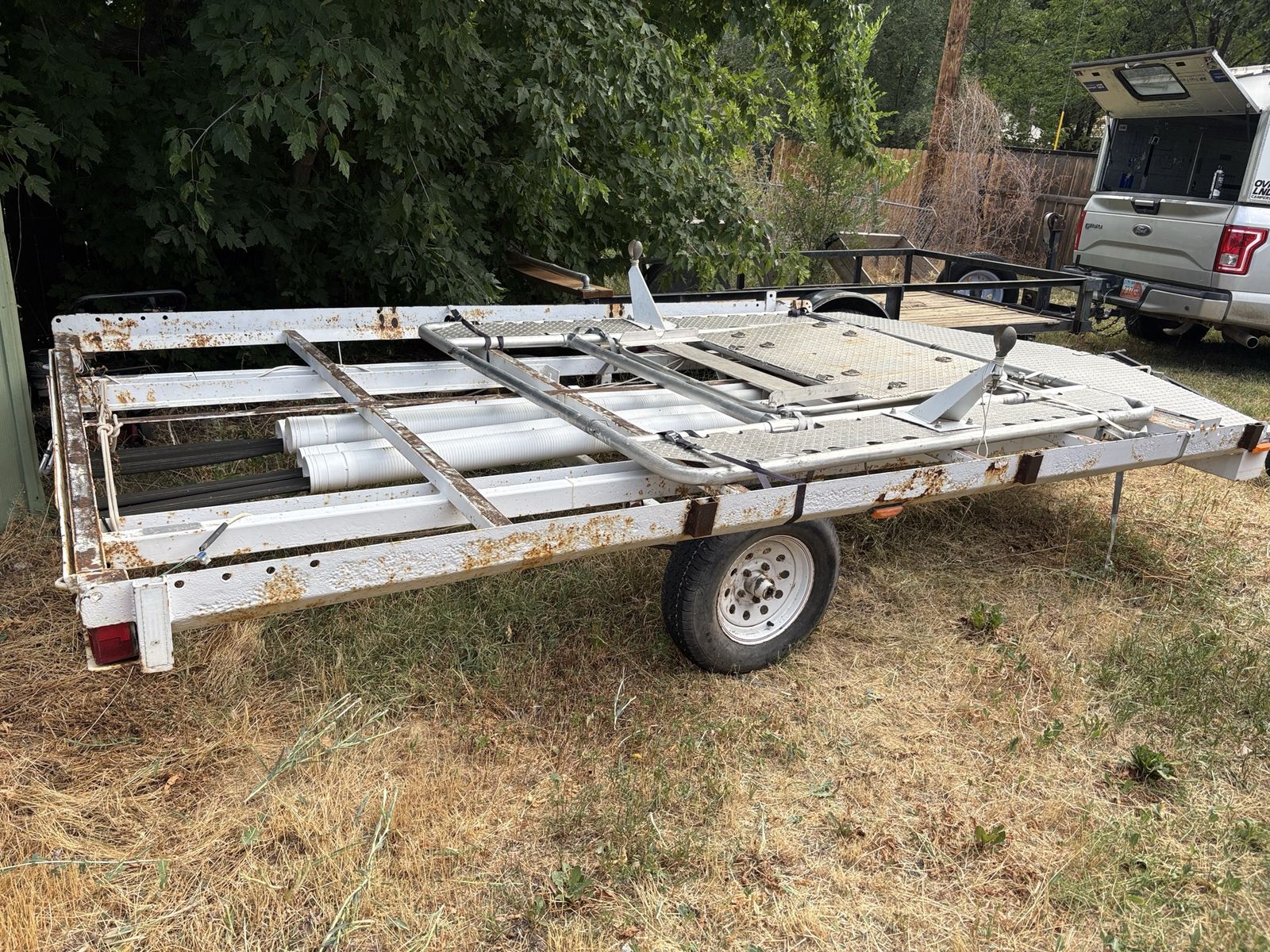 Used Utility Trailer - White Single Axle, Diamond Plate storage area.