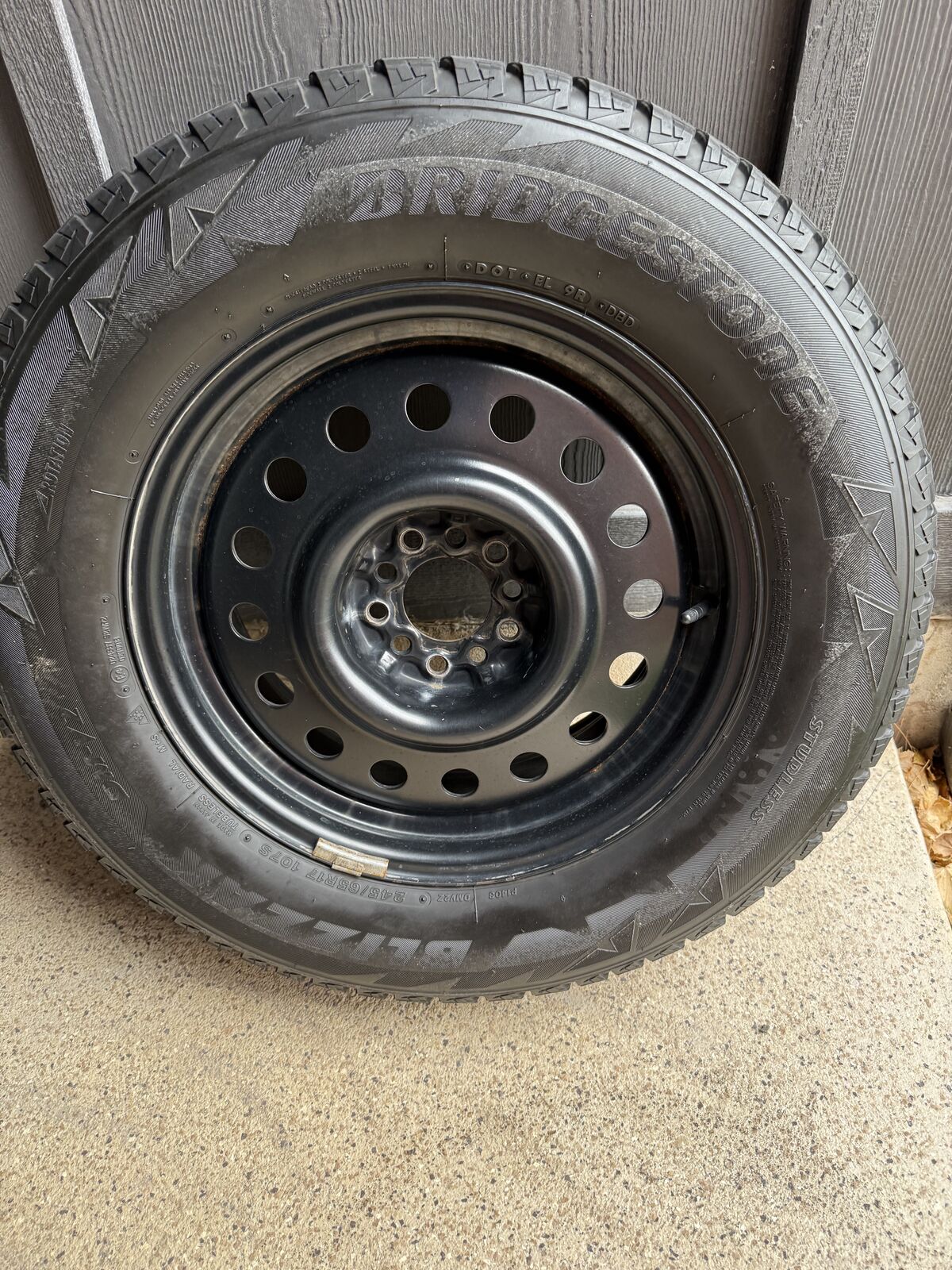 SNOW TIRES AND BLACK STEEL RIMS