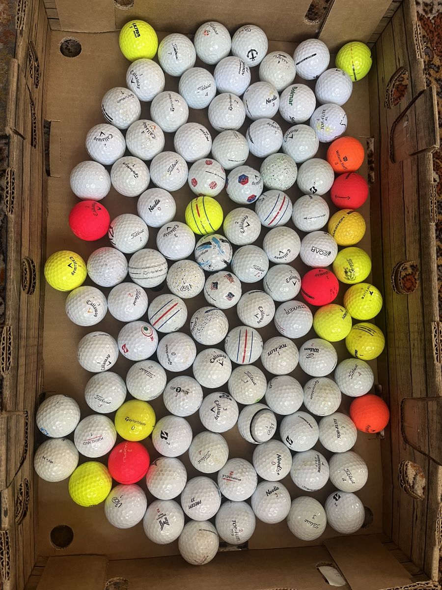 100 used golf balls