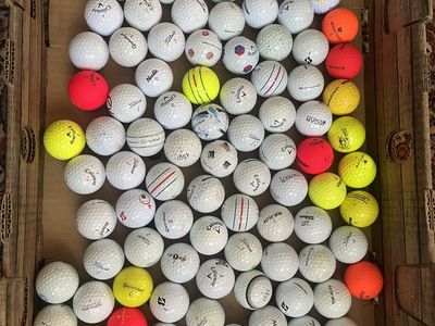 100 used golf balls