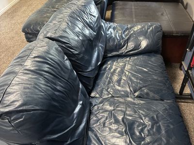 L-Shaped Blue Leather Sectional Sofa - Comfortable with Minor Wear