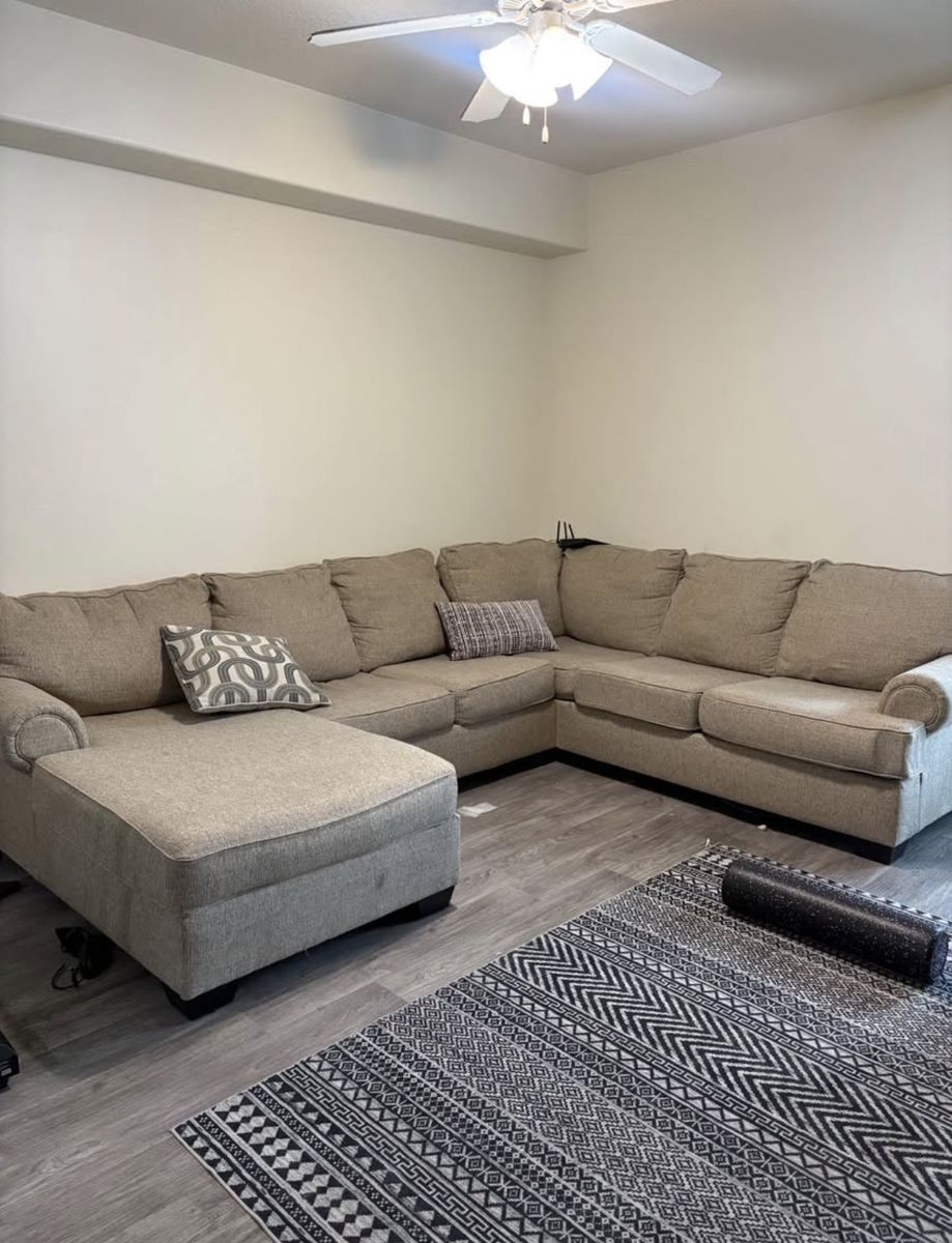 Spacious Beige Fabric Sectional Sofa with Left-Facing Chaise - Excellent Condition