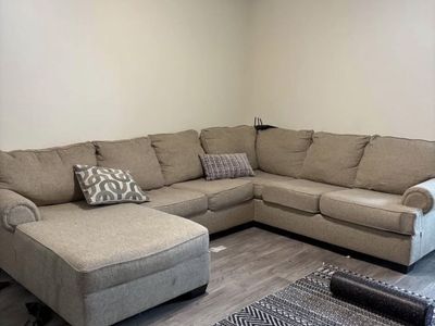 Spacious Beige Fabric Sectional Sofa with Left-Facing Chaise - Excellent Condition