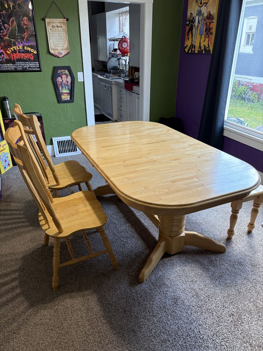 Dining table with built in leaf
