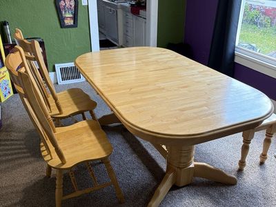 Dining table with built in leaf