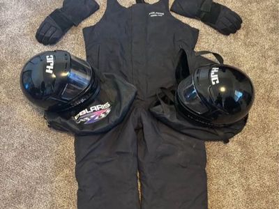 Vintage Polaris snowmobile helmet, snow overalls, gloves. Matching set.