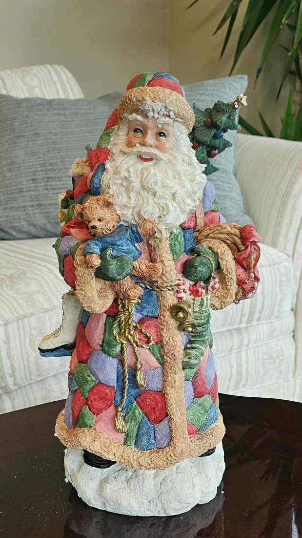 15" Resin Santa Claus Holiday Figurine with Toys and Patchwork Coat