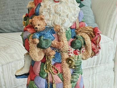 15" Resin Santa Claus Holiday Figurine with Toys and Patchwork Coat