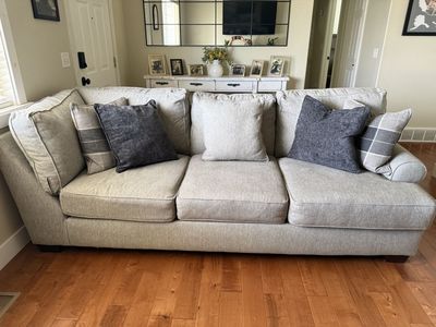 Light Gray Fabric Sofa Couch with Accent Pillows from RC Willey.