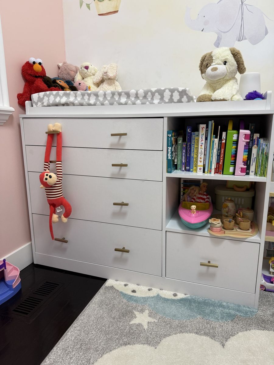 Changing table with drawers and shelves
