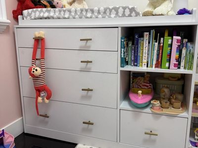 Changing table with drawers and shelves