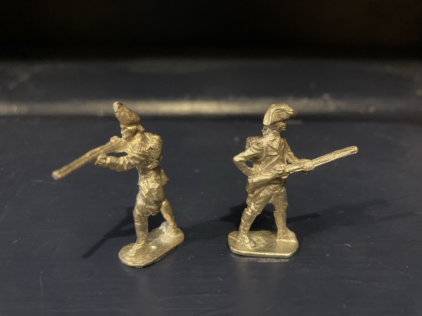 4 Cast Metal Soldiers