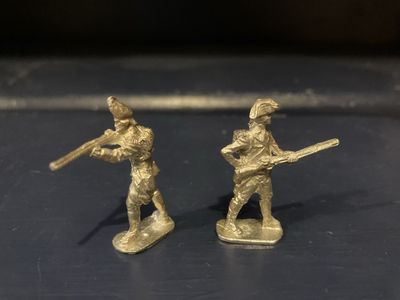 4 Cast Metal Soldiers