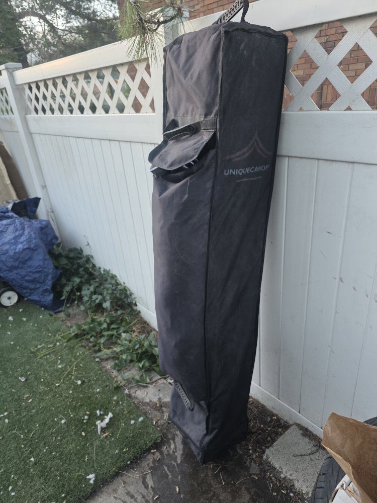 Uniquecanopy 10'x10' commercial instant shelter, which typically includes the frame, top cover, and removable sidewalls. $80.0BO