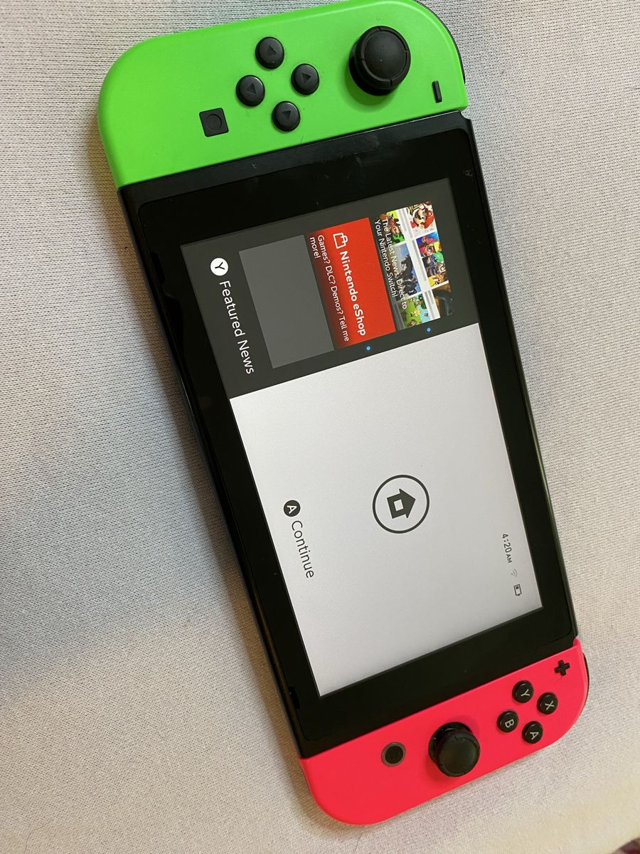 Nintendo Switch w/ 3 joy cons. Lego The Incredibles, Animal crossing.