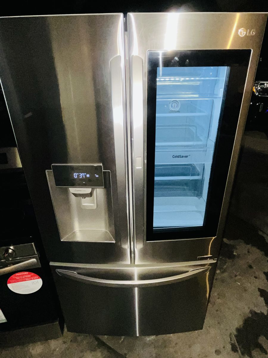 $850 OBO GOOD FRIDGE LG 1 YEAR WARRANTY
