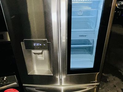 $850 OBO GOOD FRIDGE LG 1 YEAR WARRANTY