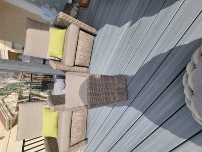 patio chairs with center table. cushions invludrf