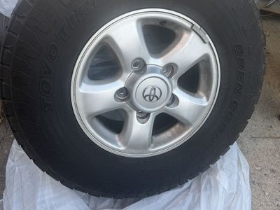 LT265/75/16 Toyo Open Country A/T All-Terrain Tire & Wheel -take offs. Great Tread, Fits Toyota Land Cruiser 100/200 & Sequoia.